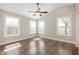 Bright bedroom with new floors, a ceiling fan, and ample natural light at 1561 Brookfield Cir, Franklin, IN 46131