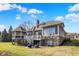 The backyard is complete with a gazebo and deck that overlook the landscaped yard, perfect for outdoor relaxation at 16129 Brookhollow Dr, Westfield, IN 46062