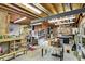 Unfinished basement area with exposed ceiling and plenty of open space for storage or activities at 16129 Brookhollow Dr, Westfield, IN 46062
