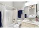 Bathroom featuring a vanity, toilet, shower with curtain, and a view of bedroom in mirror at 16129 Brookhollow Dr, Westfield, IN 46062