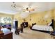 Bright bedroom features carpeted floors, ceiling fan, and princess decor at 16129 Brookhollow Dr, Westfield, IN 46062