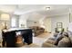 Spacious bonus room featuring plush seating, soft carpet and a calm color palette at 16129 Brookhollow Dr, Westfield, IN 46062