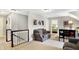 Upstairs hall featuring cozy seating, soft carpet and access to other rooms at 16129 Brookhollow Dr, Westfield, IN 46062
