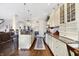 Spacious kitchen boasts granite countertops, an island with bar seating, and custom cabinetry at 16129 Brookhollow Dr, Westfield, IN 46062