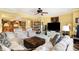 Relaxing living area with comfortable seating, natural light, and easy access to the kitchen at 16129 Brookhollow Dr, Westfield, IN 46062