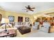 Inviting living area features neutral tones and a seamless flow to the open-concept kitchen at 16129 Brookhollow Dr, Westfield, IN 46062