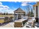 Inviting patio featuring a gazebo, outdoor seating, and views of the water creating a relaxing and picturesque setting at 16129 Brookhollow Dr, Westfield, IN 46062