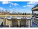 Scenic outdoor bar overlooking a tranquil pond, perfect for enjoying a refreshing drink and the beautiful views at 16129 Brookhollow Dr, Westfield, IN 46062