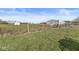 Outbuildings and barns sit on a large lot with grassy fields and wire fencing at 1636 N County Road 425 E, Avon, IN 46123