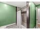 Bathroom featuring a shower with tiled walls and decorative flooring at 1636 N County Road 425 E, Avon, IN 46123