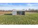 Open shed on a grassy lot offers storage and functionality for lawn equipment and other supplies at 1636 N County Road 425 E, Avon, IN 46123
