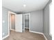 Cozy bedroom featuring a closet and neutral tones, providing a calming space for relaxation at 1653 S Delaware St, Indianapolis, IN 46225