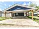This house features a convenient carport, offering covered parking and protection from the elements at 1653 S Delaware St, Indianapolis, IN 46225