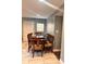 Dining room with a wooden table and tile floors at 1921 W Michigan St, Indianapolis, IN 46222
