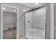 Clean and modern bathroom featuring glass shower enclosure and walk-in closet at 19970 Edwick Dr, Westfield, IN 46074