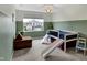 Bright bedroom featuring modern decor, neutral carpet, and natural light at 19970 Edwick Dr, Westfield, IN 46074