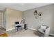 Modern home office with stylish accent wall, sleek desk, and cozy sitting area at 19970 Edwick Dr, Westfield, IN 46074