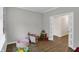 Bright playroom with toy kitchen, ball pit, rocking horse, and shelving at 19970 Edwick Dr, Westfield, IN 46074