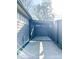 A concrete driveway leads to a black pergola at 2037 Ruckle St, Indianapolis, IN 46202