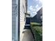 Property side view showing walkway and privacy fencing at 2037 Ruckle St, Indianapolis, IN 46202