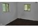 Vacant bedroom with hardwood floors and natural light streaming through the windows at 2194 N Riley Ave, Indianapolis, IN 46218