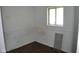 Unfurnished bedroom with a window and some damaged walls at 2194 N Riley Ave, Indianapolis, IN 46218