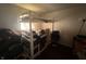 A bedroom with a bunk bed and personal belongings at 2194 N Riley Ave, Indianapolis, IN 46218