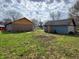 View of new home construction with detached garage in the backyard at 2860 S Rybolt Ave, Indianapolis, IN 46241