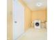 Functional laundry room with washer, dryer, and neutral walls at 2885 Holiday Way, Greenwood, IN 46143