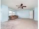 Bright living room with carpet and neutral colored walls at 2885 Holiday Way, Greenwood, IN 46143