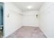 Spacious walk-in closet features built-in shelving for optimal storage solutions at 2885 Holiday Way, Greenwood, IN 46143