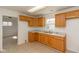 Charming kitchen equipped with wood cabinetry and a stainless steel sink at 380 Parkway St, Whiteland, IN 46184