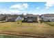 Stunning aerial view of the property, highlighting the backyard and neighborhood pond at 4148 Basswood Dr, Danville, IN 46122