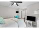 Comfortable bedroom features carpeted floors, a ceiling fan, and a mounted TV at 4148 Basswood Dr, Danville, IN 46122