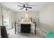 Cozy bedroom features a decorative metal bed frame with carpeted floors and a ceiling fan at 4148 Basswood Dr, Danville, IN 46122