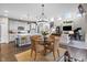 Inviting dining area next to the kitchen and living room offers natural light and a welcoming atmosphere at 4148 Basswood Dr, Danville, IN 46122