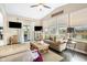 Bright living room with vaulted ceilings, a view of the backyard pond and lots of natural light at 4148 Basswood Dr, Danville, IN 46122