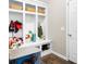 A well-organized mudroom provides storage for coats, shoes, and accessories near the home entrance at 4148 Basswood Dr, Danville, IN 46122