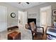 Comfortable home office featuring a ceiling fan, work desk, chair and a relaxing sitting area for breaks at 4148 Basswood Dr, Danville, IN 46122