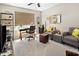 Well-lit office with lots of natural light, a ceiling fan, and comfortable seating to promote productivity at 4148 Basswood Dr, Danville, IN 46122