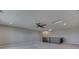 Upper bonus room featuring plush carpeting, neutral paint, a ceiling fan, and a skylight at 4182 Backstretch Ln, Bargersville, IN 46106