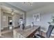 Stylish home office featuring an ample window, pendant lighting, and light, neutral colors at 4182 Backstretch Ln, Bargersville, IN 46106