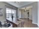 Well-lit home office with hardwood floors, an ample window, and modern decor at 4182 Backstretch Ln, Bargersville, IN 46106