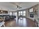 Bright and airy living room with hardwood floors, fireplace, and an open-concept layout at 4182 Backstretch Ln, Bargersville, IN 46106