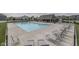 View of the pool and lounge chairs with a clear pool and the neighborhood in the background at 4182 Backstretch Ln, Bargersville, IN 46106