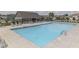 Neighborhood pool featuring lounge chairs and a nearby club house at 4182 Backstretch Ln, Bargersville, IN 46106