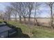 Backyard featuring a deck with railing and a wide view of trees and the neighborhood at 4182 Backstretch Ln, Bargersville, IN 46106