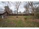 Fenced backyard with shed and soccer net, offering a private outdoor space for recreation at 5915 Lowell Ave, Indianapolis, IN 46219