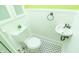 Charming bathroom with vintage-style fixtures, a toilet, and hexagonal tile flooring at 5915 Lowell Ave, Indianapolis, IN 46219