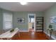 Inviting dining room with hardwood floors, modern furniture, and access to the bright kitchen at 5915 Lowell Ave, Indianapolis, IN 46219